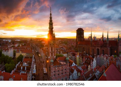 Amazing architecture of the main city in Gdansk at sunset, Poland. Aerial view of the Long Market, Main Town Hall and St. Mary Basilica