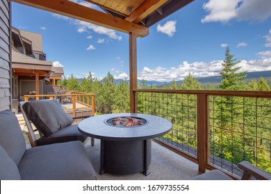 Amazing Balcony Patio With Fire Pit And Forest And Mountains View. Dream Come True Home Exterior. New American Architecture. Comfortable And Beautiful Home Details.