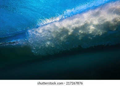 Amazing barrel wave crashing shot from underneath the surface of the ocean