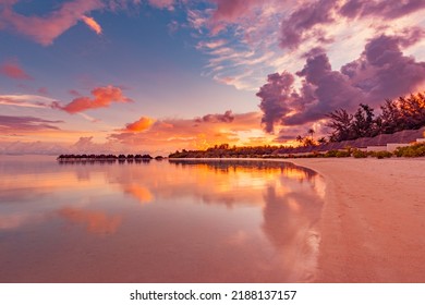 Amazing beach landscape. Beautiful Maldives sunset seascape view. Horizon colorful sea sky clouds, over water villa pier pathway. Tranquil island lagoon, tourism travel background. Exotic vacation - Powered by Shutterstock
