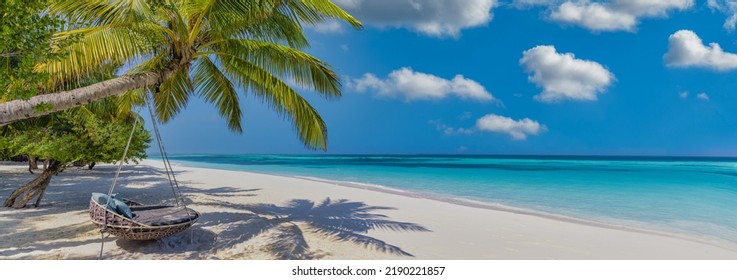 Amazing beach landscape, super wide panoramic exotic travel background. Luxury travel, idyllic couple honeymoon love destination. Sunny sea sand sky, exotic resort coast. Palm lagoon, seascape banner