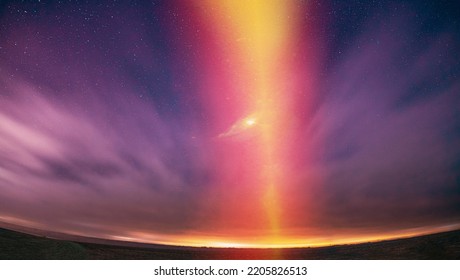 Amazing Beautiful Light Purpurea Illuminated Sky. Pink Light Effect Night Starry Sky Above Rural Countryside. Stars Flare Backlight Natural Background. Soft Colors. Concept Of Dream View. Imagination. - Powered by Shutterstock