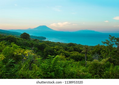 amazing beautiful scenic view of active volcano Mount Agung in Bali island of Indonesia on sunset in Asia travel destination and Summer holidays trip concept  - Shutterstock ID 1138953320