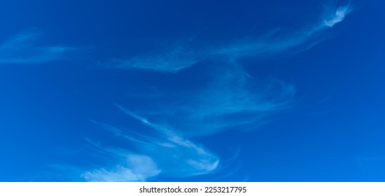 Amazing Beautiful white fluffy clouds on a bright blue sky background.clear sky cloudy background.selection focus. - Shutterstock ID 2253217795
