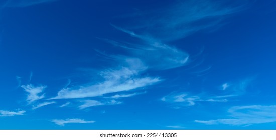 Amazing Beautiful white fluffy clouds on a bright blue sky background.clear sky cloudy background.select focus. - Shutterstock ID 2254413305