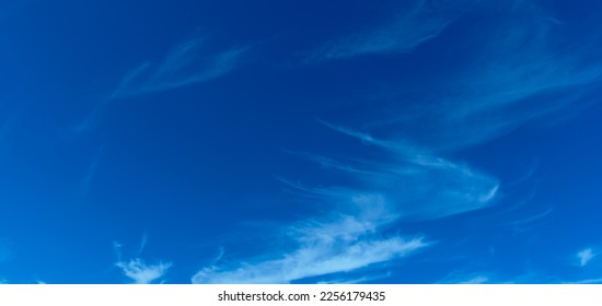Amazing Beautiful white fluffy clouds on a bright blue sky background.clear sky cloudy background. - Shutterstock ID 2256179435