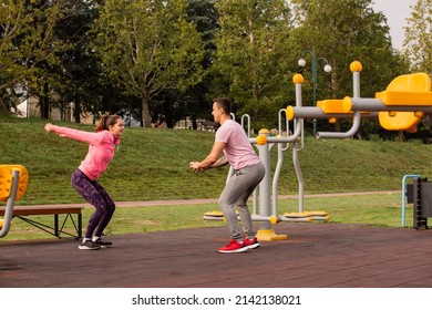 Amazing and beautiufl couple is doing some jumping exercise