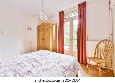 Amazing Bedroom With A Double Soft Bed And Parquet Floor