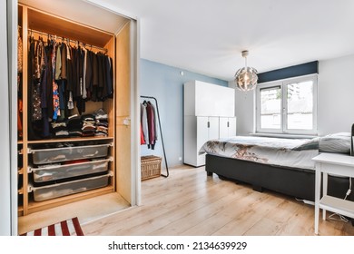 Amazing Bedroom With Parquet Floor And Comfortable Bed