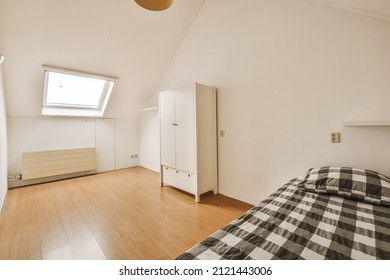 Amazing Bedroom With A Soft Bed With Parquet Floor