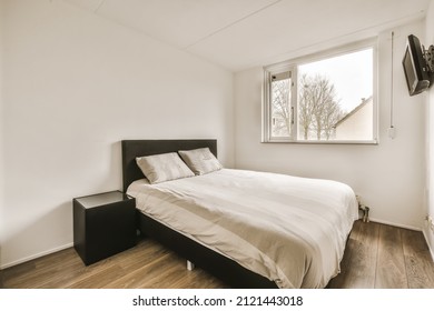 Amazing Bedroom With A Soft Bed With Parquet Floor