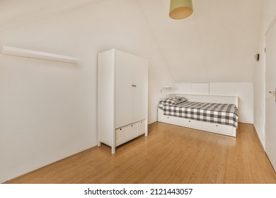 Amazing Bedroom With A Soft Bed With Parquet Floor