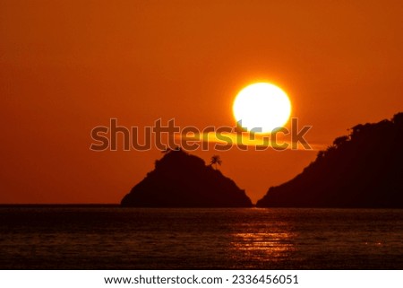 Amazing big sun in sunset sky, Majestic sunset clouds sky landscape,Amazing light of nature cloudscape sunset or sunrise sky over sea landscape background