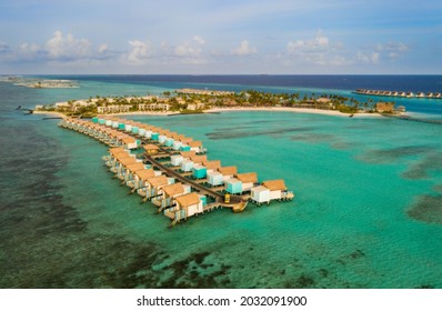 Amazing Bird Eyes View In Maldives Island Eh'mafushi Crossroads Maldives At Sunrise. Aerial Drone Shot. Hard Rock Hotel. July 2021