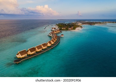 Amazing Bird Eyes View In Maldives Island Eh'mafushi Crossroads Maldives At Sunrise. Aerial Drone Shot