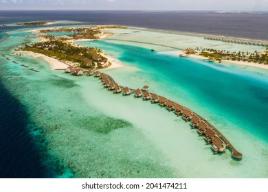 Amazing Bird Eyes View In Maldives Island Eh'mafushi Crossroads Maldives At Sunrise. Aerial Drone Shot. Saii Lagoon And Hard Rock Hotel. July 2021