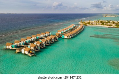 Amazing Bird Eyes View In Maldives Island Eh'mafushi Crossroads Maldives At Sunrise. Aerial Drone Shot. Hard Rock Hotel. July 2021