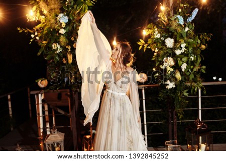 Amazing bride on the night wedding ceremony 