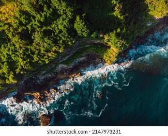 Amazing Cliff With Rocks And Blue Ocean In Bali. Aerial View