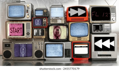 Amazing collection of vintage and retro televisions made into a tv wall with cinema countdowns on the screen - Powered by Shutterstock