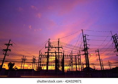Amazing colored sky on evening time,Sunset with silhouettes substation at 
Southern Thailand:Select focus with shallow depth of field.