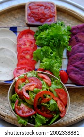 Amazing Colorful Raw Material Food For Vegan Hamburger From Violet Sweet Potato With Tomato Sauce, Salad, Cucumber, Healthy Food For Breakfast That Rich Starch, Fiber