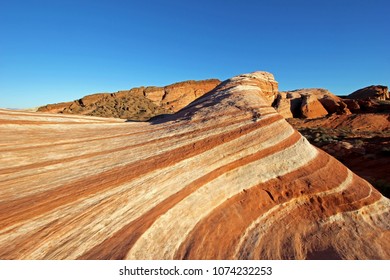 Amazing colors and shape of the Fire Wave at sunset, Valley of Fire State Park, Nevada, USA