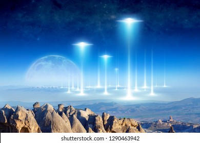 Amazing fantastic background - ufo fly above surreal terrain, alien arrival on planet Earth, full moon rises above the horizon. Elements of this image furnished by NASA