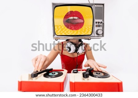 Amazing female dj with a television as a head. On the screen is woman's red lips