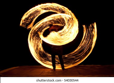 Amazing Fire Show at night on Phi Phi Island, Thailand - Powered by Shutterstock