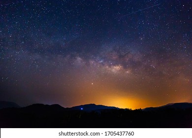 Amazing Galaxy With The Milky Way And Golden Bright Light Before Sunrise, The Starry In The Night Sky Are Visible From Earth