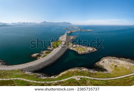 Amazing great atlantic ocean road located in Norway's west coast. Amazing bridge connecting the small islands. Summer day in Scandinavia. Long road connecting lots of small islands. Curved bridges
