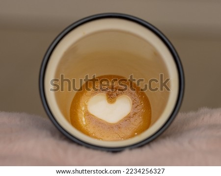 Amazing a heart shape formed on the bottom of my Piccolo Latte. After completing my coffee a love heart appeared in the bottom of the cup its truly freakish  