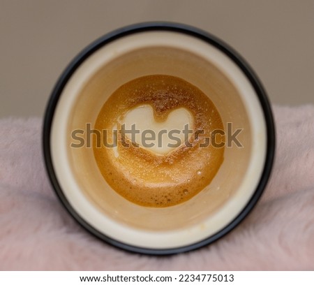 Amazing a heart shape formed on the bottom of my Piccolo Latte. After completing my coffee a love heart appeared in the bottom of the cup its truly freakish  
