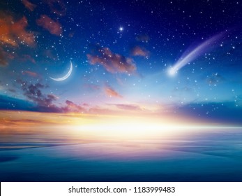 Amazing heavenly background - beautiful glowing sunset with falling comet - mystical sign in sky, rising crescent moon and stars. Elements of this image furnished by NASA