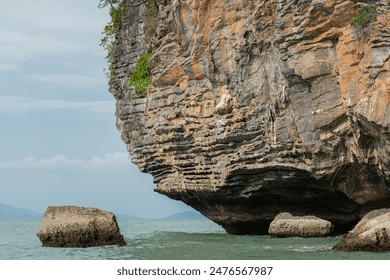Amazing hillside cliff with compressed layer rock structure or call Pancake rock in the nature geological. 
