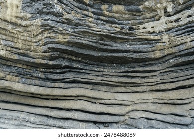 Amazing hillside cliff with compressed layer rock structure or call Pancake rock in the nature geological.  - Powered by Shutterstock