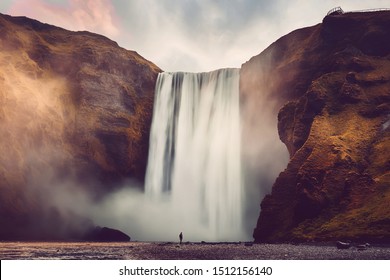 Amazing Icelandic Landscape. Incredible view of famous Skogafoss waterfall during sunset. Dramatic Scenery of Iceland. Skogafoss Waterfall. Iceland the most beautiful and best travel place. postcard
