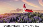 Amazing Icelandic Landscape. Scenic image of most popular tourist destination of Iceland. Great view of Vikurkirkja christian church in evening light. Vik i Myrdal village, Iceland, Europe. 