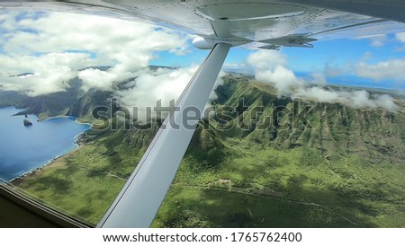 Amazing Islands tropical coastline aerial view from plane while flying over Hawaii islands, Honolulu, Maui, kauai, big islands USA. where the adventure begin. Journey concept.
