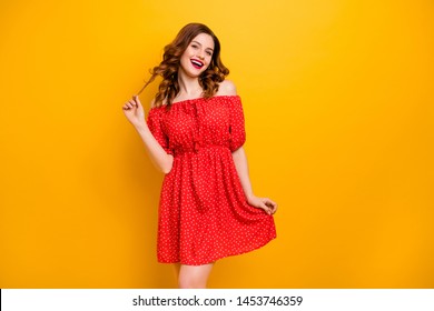 Amazing lady touch curly hairstyle ready for birthday party wear off-shoulders dress isolated yellow background