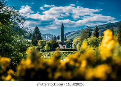 Amazing Landscape And A Irish Round Tower From Glendalough National Park. Irish Round Towers Are Early Medieval Stone Towers Of A Type Found Mainly In Ireland.