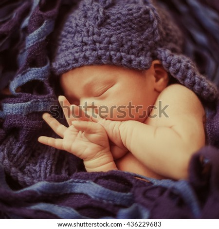 Similar – Image, Stock Photo Newborn baby with pompom hat sleeping and laughing on blanket