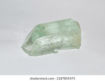 Amazing Macro Closeup Of Green Rare Fluorite Mineral Specimen On White Background. Rare Color Mineral Gem Stone