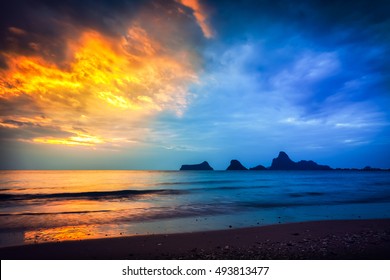 Amazing Morning Photo Dramatic Sunrise, Day Vs Night With Scenic Cloudy Colorful Sky On Tropical Sandy Beach On Background Sea Ocean Water With Golden Wave And Silhouette Mountain On Horizon