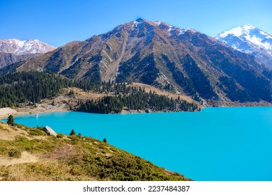 Amazing mountain lake with turquoise water, Big Almaty lake.  - Shutterstock ID 2237484387