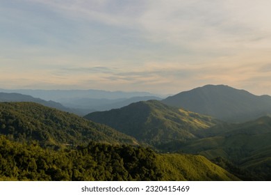 Amazing mountain landscape colorful sunset over the cloudy sky. - Powered by Shutterstock