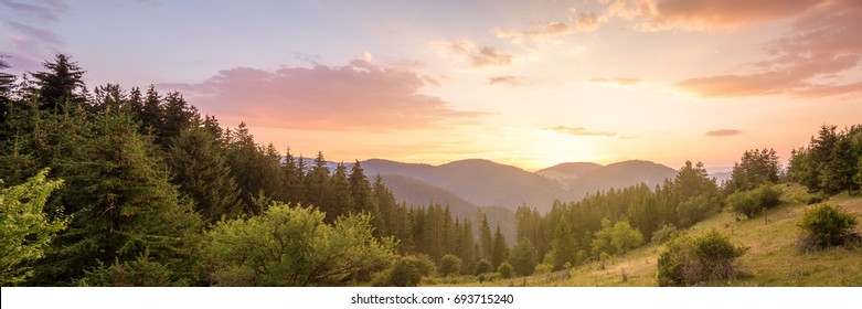 Amazing mountain landscape and colorful vivid sunset the cloudy sky  natural outdoor travel background  Beauty world 