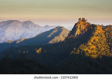 Amazing mountain range landscape with sunshine during sunrise, Pha Ngom cliff at Khun Chae National Park locate in Amper. Wiangpapao , Chaingrai district Thailand. - Shutterstock ID 2107412405