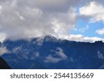 amazing mountains between clouds - european nature- mountains landscaspe - alpine landscsape - austrian alps